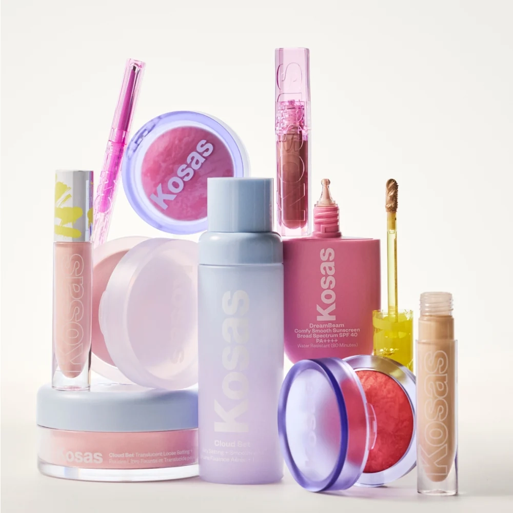 Kosas bestsellers grouped together: concealers, a pot of blush and bottles