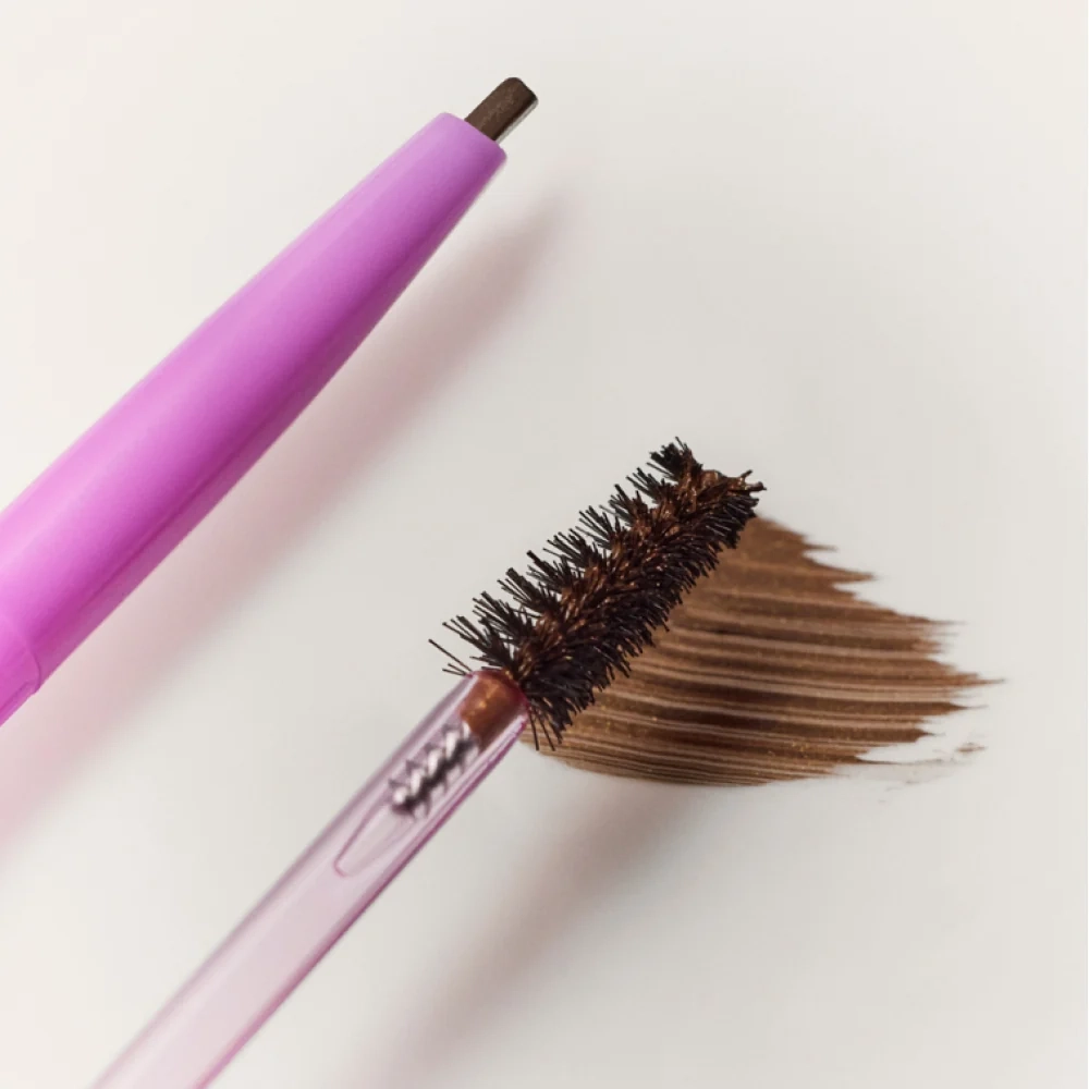 Brow: a pencil with a spoolie of brown hair