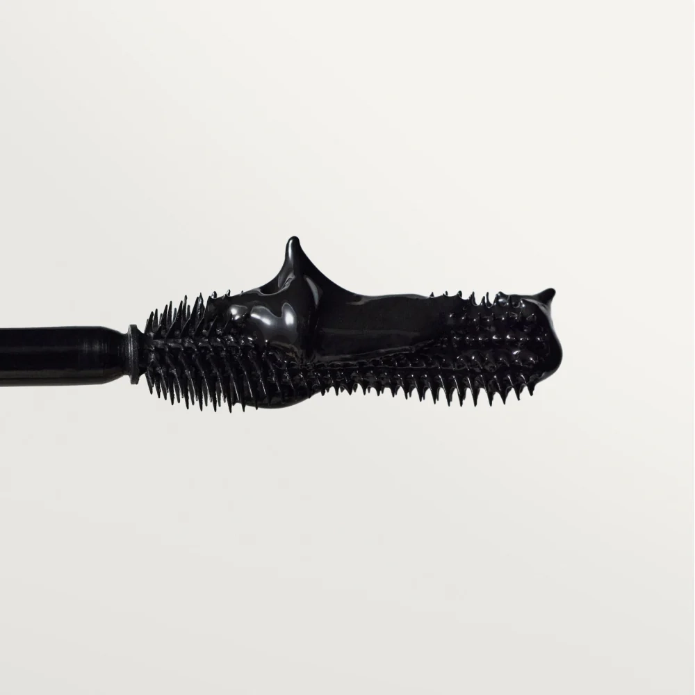 Eye: a black mascara wand